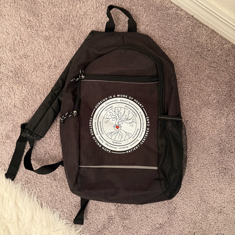black and white nursing backpack